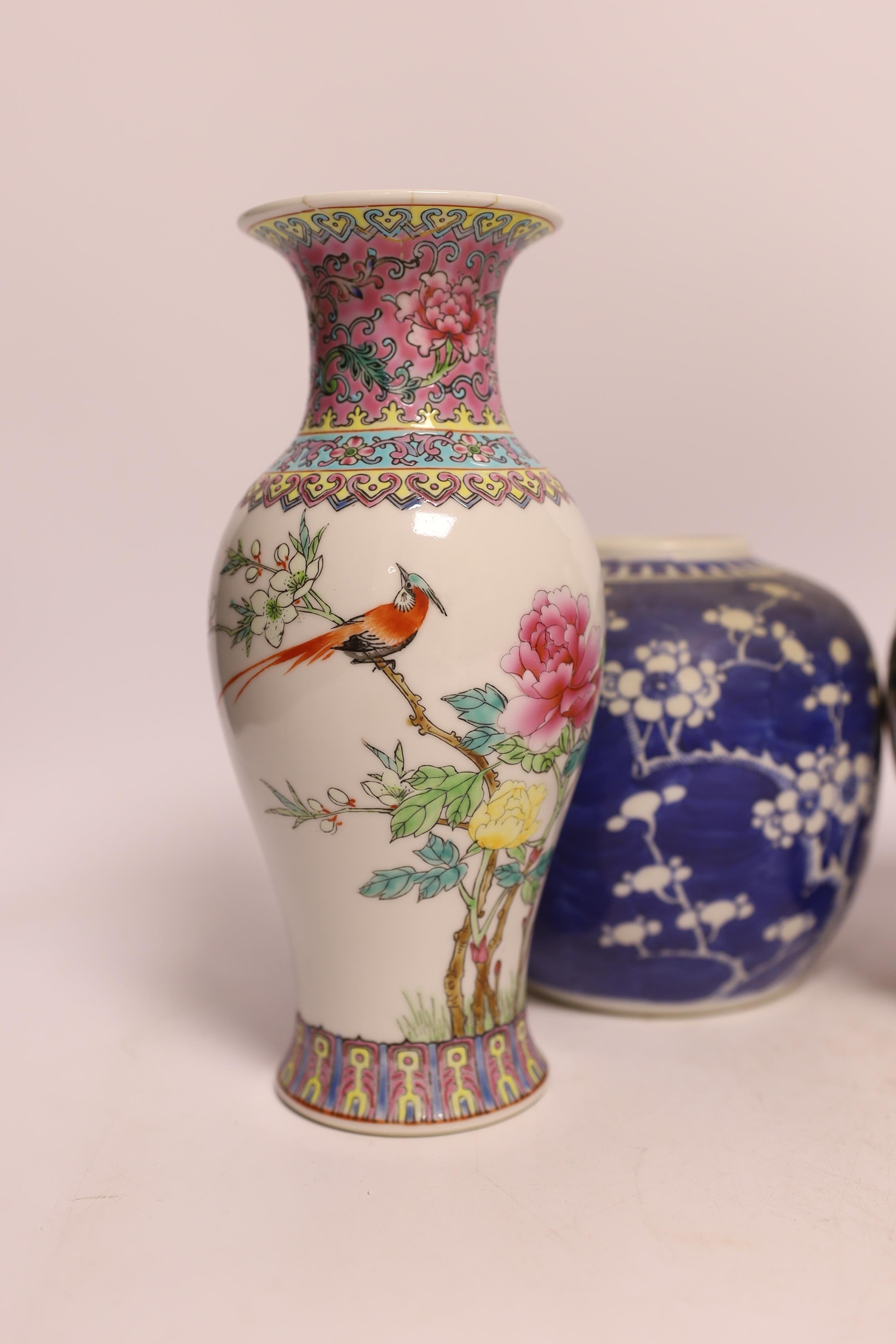 Four Chinese items; a pair of prunus another and a famille rose vase, tallest 20.5cm high